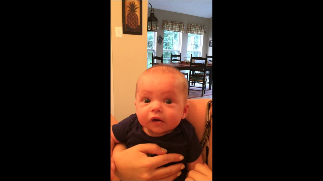 Baby Atticus eating his cereal for the first time.
