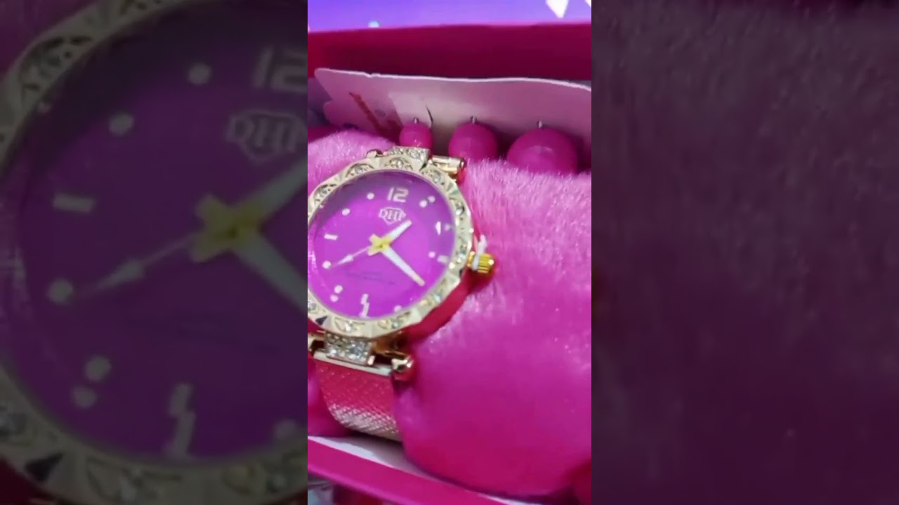 KF013 - Rel&oacute;gio DHP original metal dourado com pedrarias.