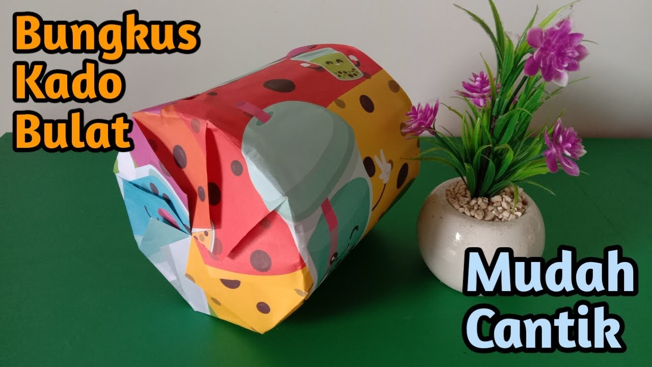 Cara membungkus kado bulat dengan mudah