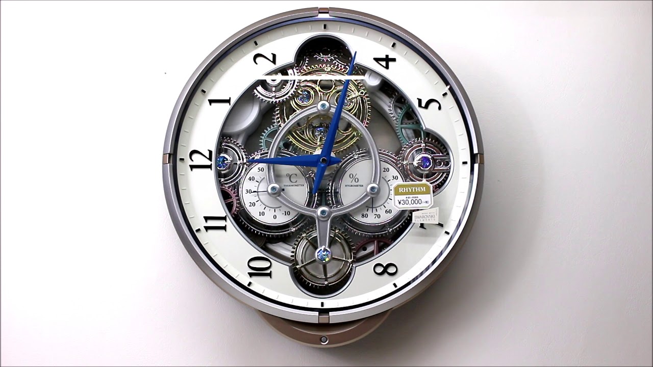 リズム時計 からくり時計 電波時計 スモールワールシーカーJ メロディ30曲 ピンクメタリック色 4MN529RH13　Rhythm Melodies In Motion Wall Clock