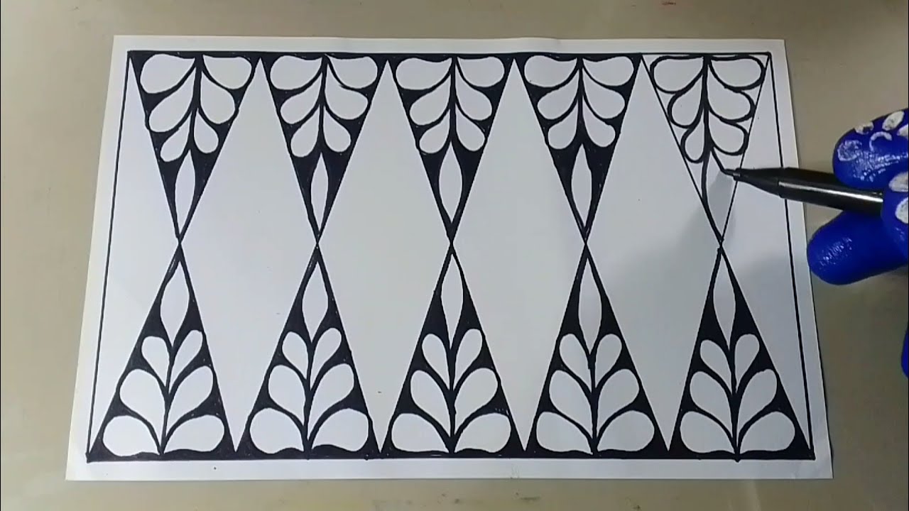 Cara menggambar batik bunga pola batik tumpal. 