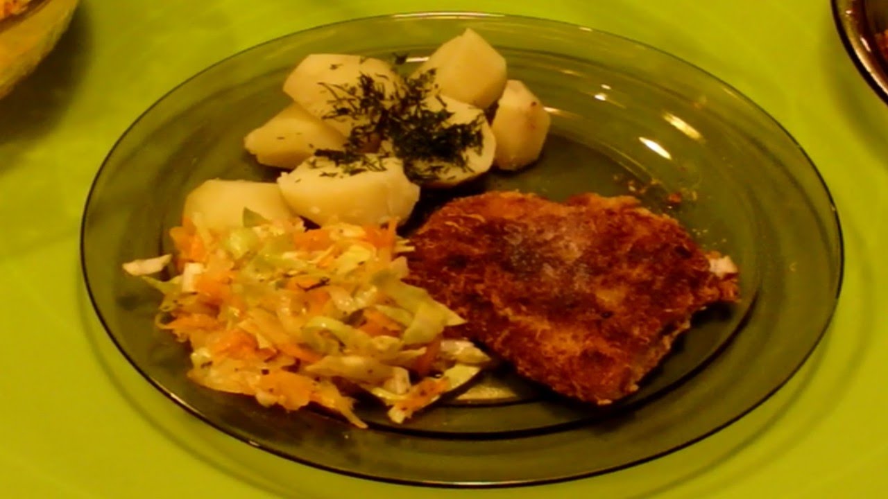 Ryba (tołpyga) smażona w panierce serowej