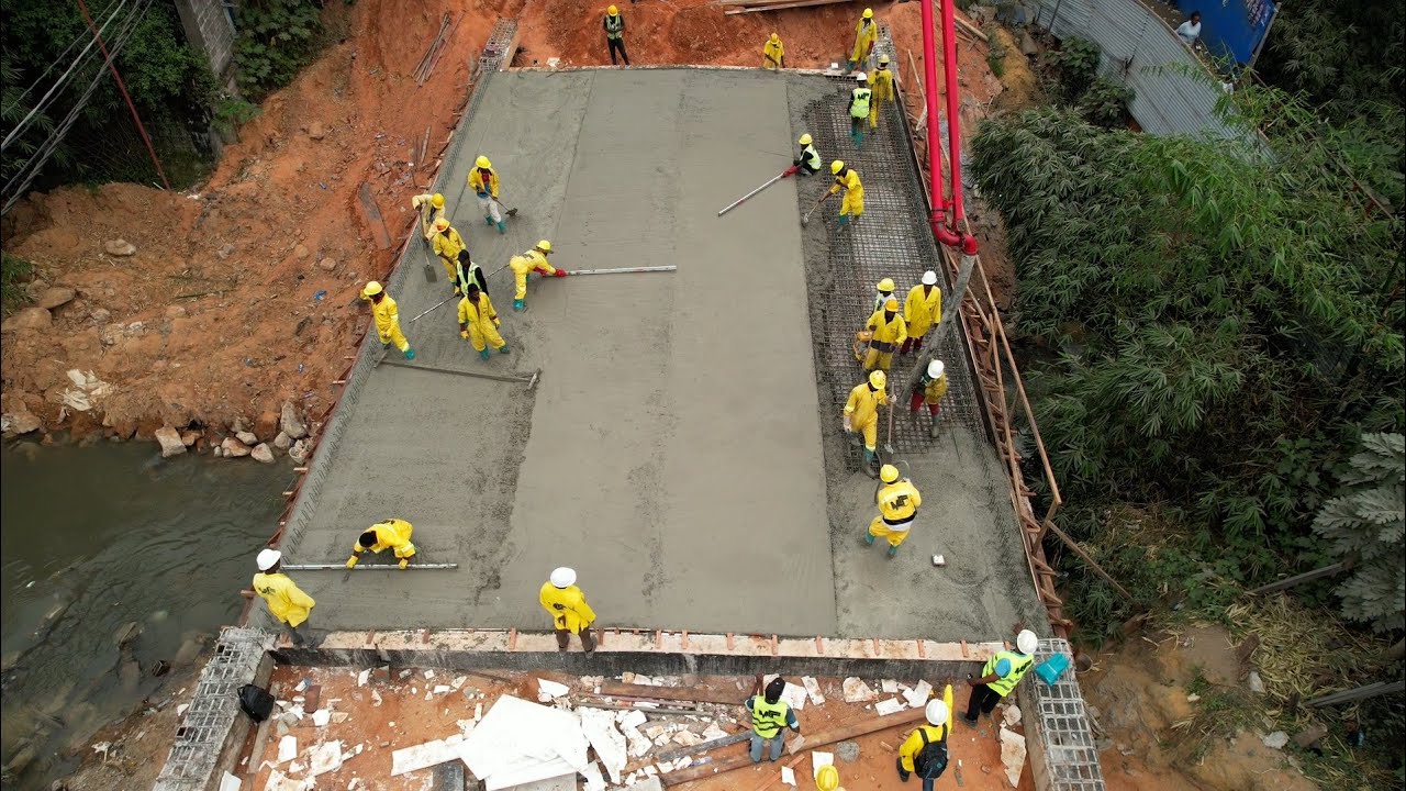 PROJET KIN-ELENDA : BÉTONNAGE DE LA DALLE DU NOUVEAU PONT M'FUSU À PLAZA KINKOLE