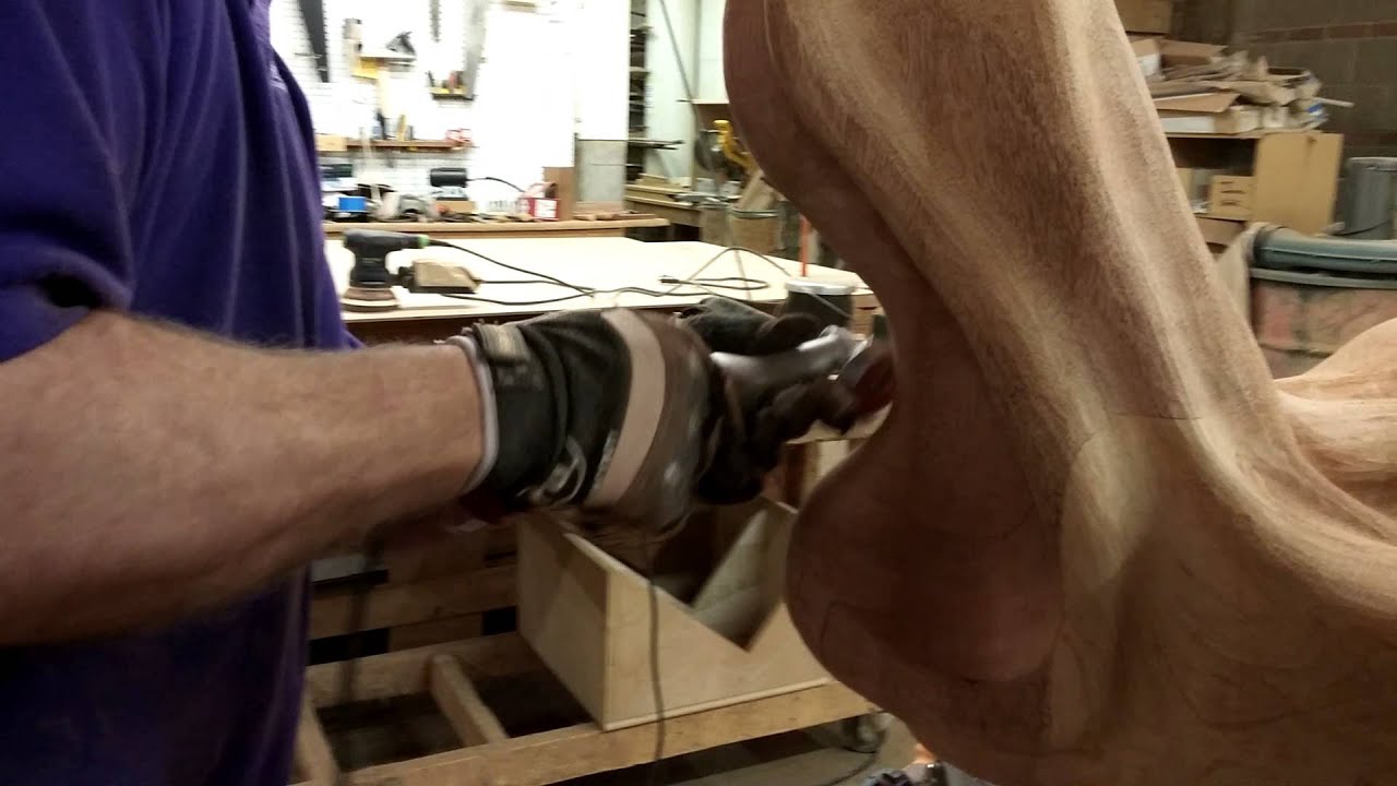 Carving with grinders for an Art Nouveau coffee table