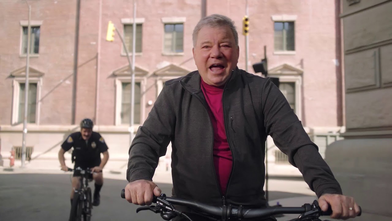 William Shatner is pursed by police on his Pedego electric bicycle