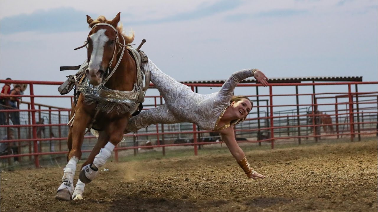 Shelby Pierson & Haley Proctor Trick Riding at the 100th Wolf Point Wild Horse Stampede