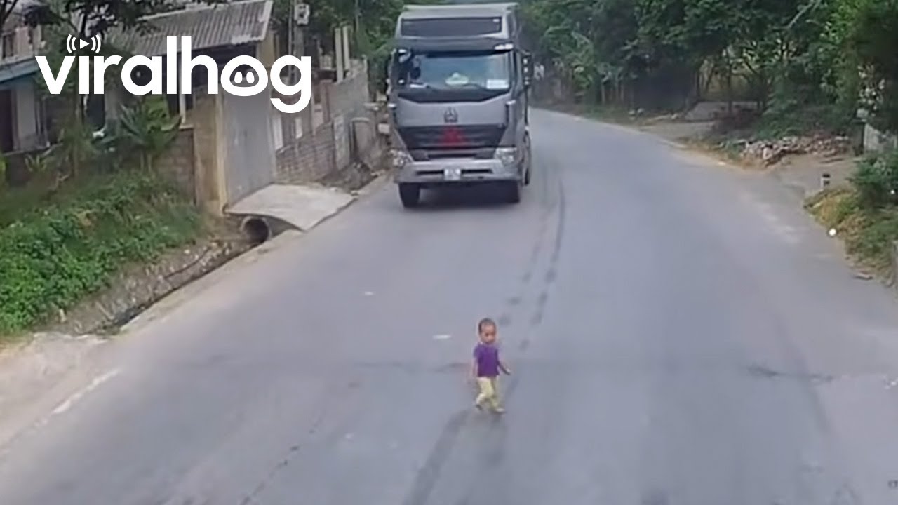 Baby Runs onto Road || ViralHog