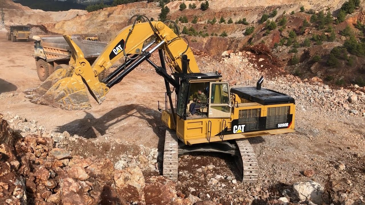 Caterpillar 5090B Shovel Excavator Loading Caterpillar 777C Dumpers - Sotiriadis/Labrianidis Mining