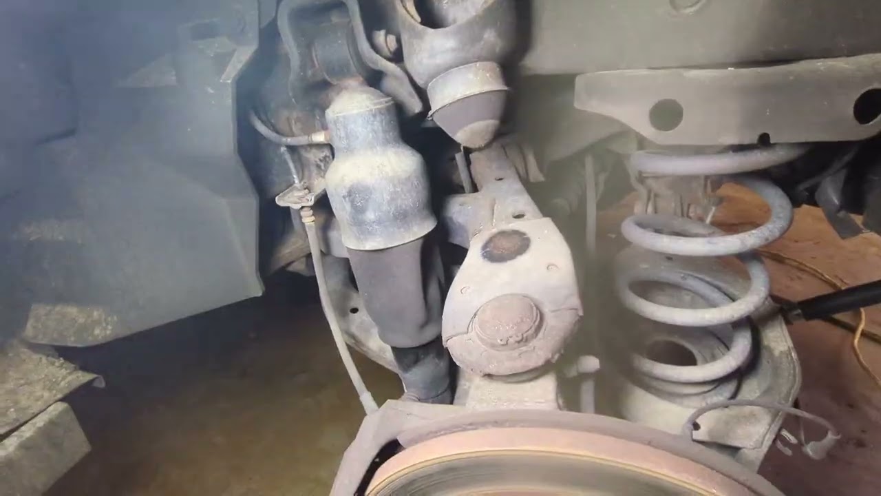 Infinity QX56 rear coil spring and shock replacement with 3-inch spacers