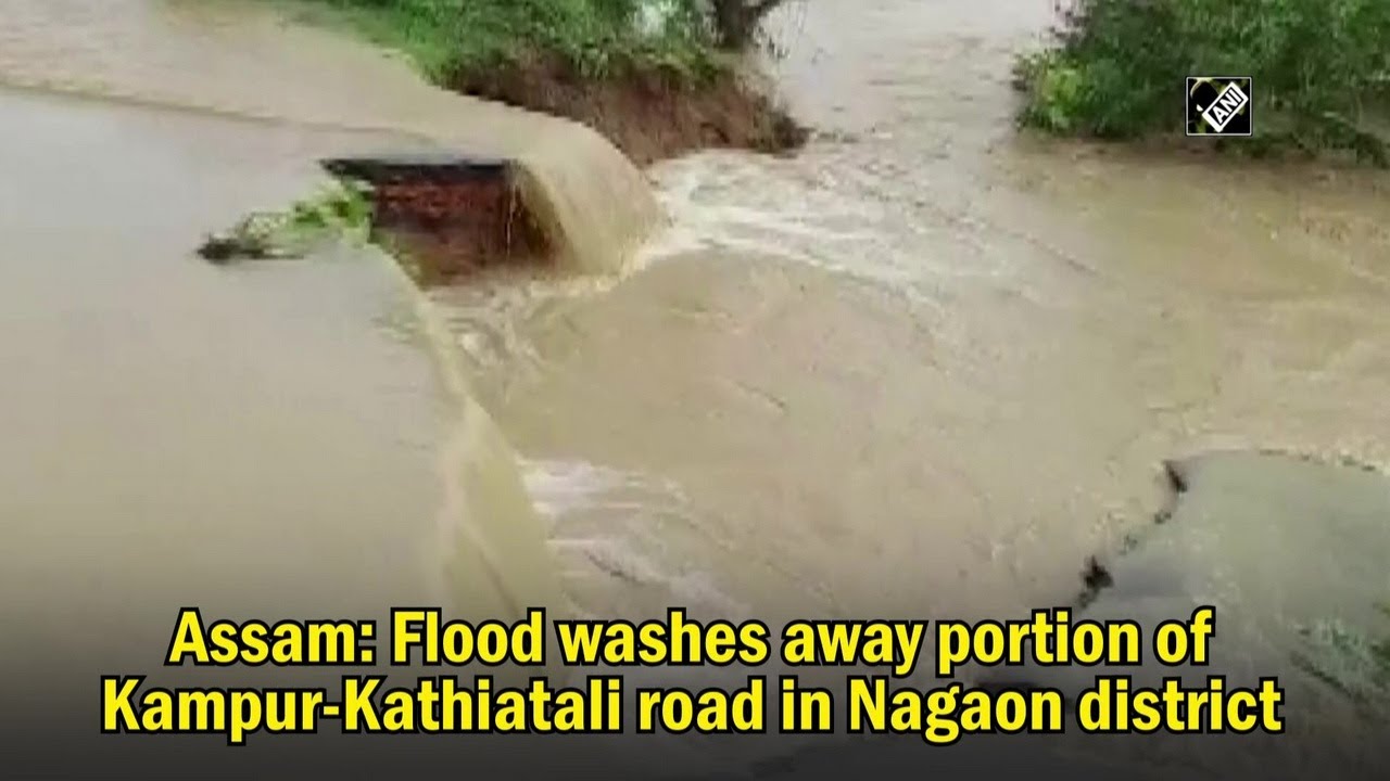 Assam: Flood washes away portion of Kampur-Kathiatali road in Nagaon district I Assam News