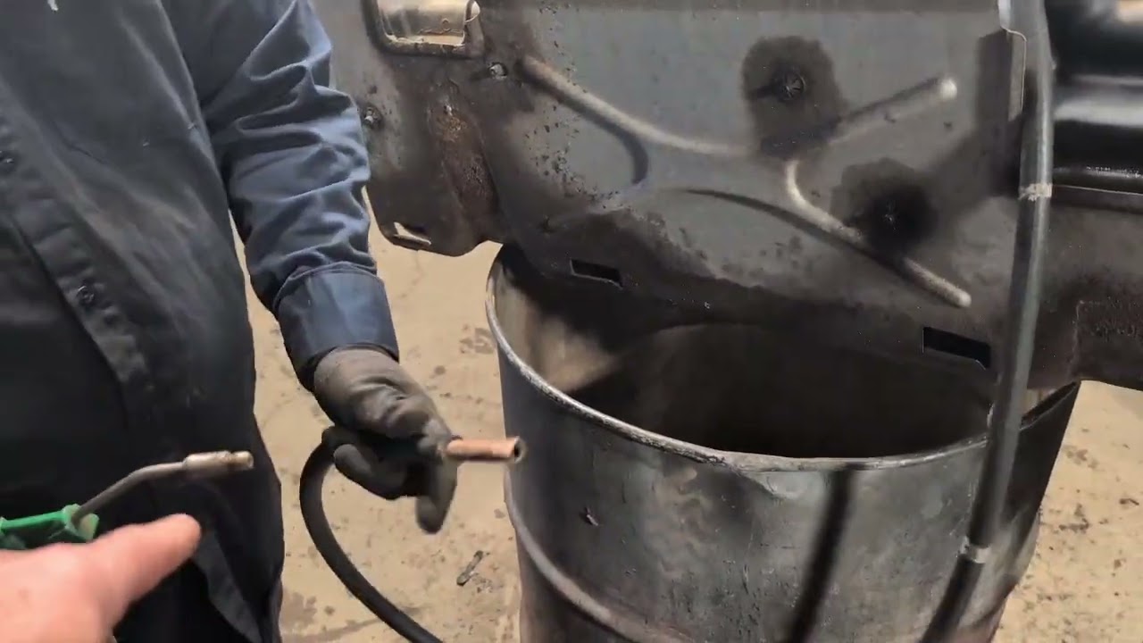 Quick & easy way to create a siphon with compressed air and a hose 