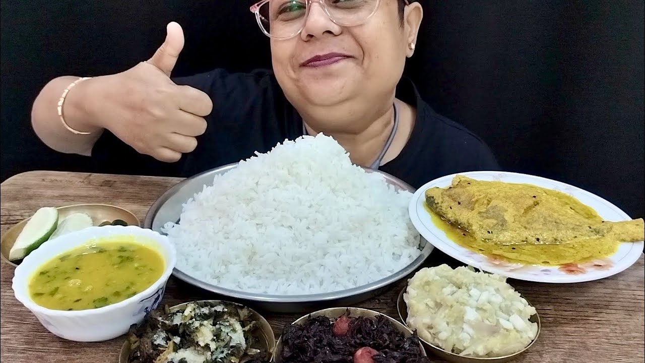 Bengali comfort food, pomfret er jhaal, daal with alu chokha, karela fry and laal saag