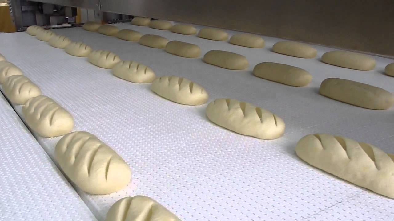 Tunnel ovens and complete lines for industrial baking