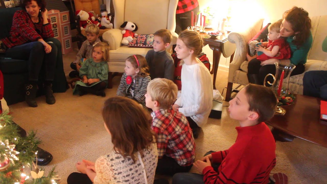 Singing Santa reads “The Night Before Christmas”