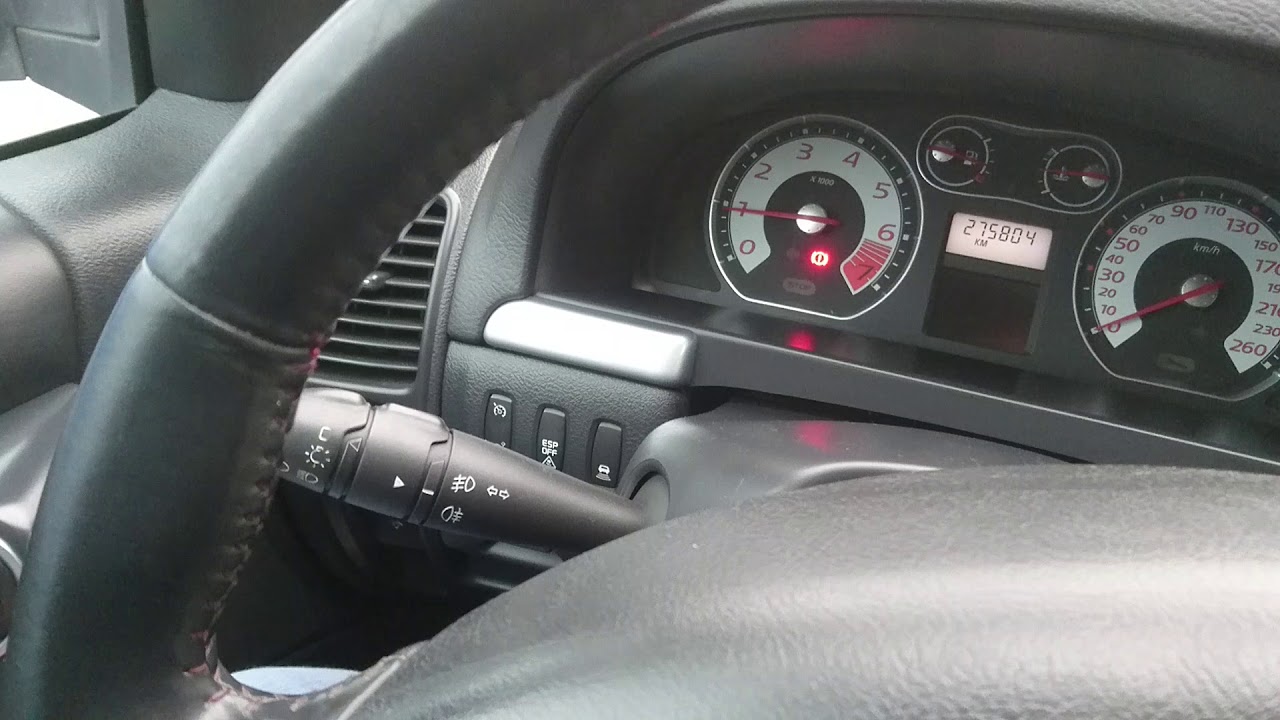 Jak aktywować automatyczne światła w Renault Laguna II po lifcie.