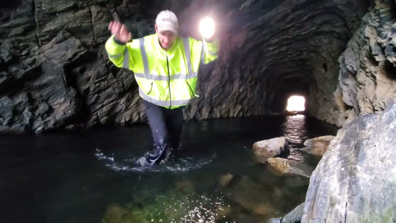 Flooded Train Tunnels Filled With Antique Cars Parts