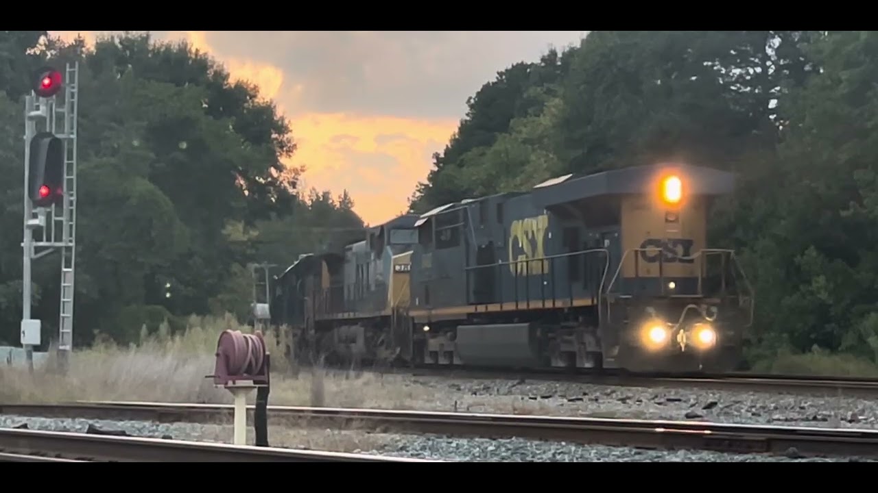 CSX intermodal train goes through Monroe, NC with a geep and an SD40 trailing
