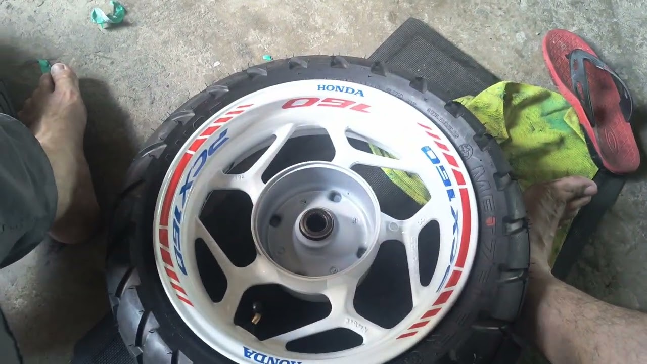 Colocando pneus nas rodas pintadas da PCX 160