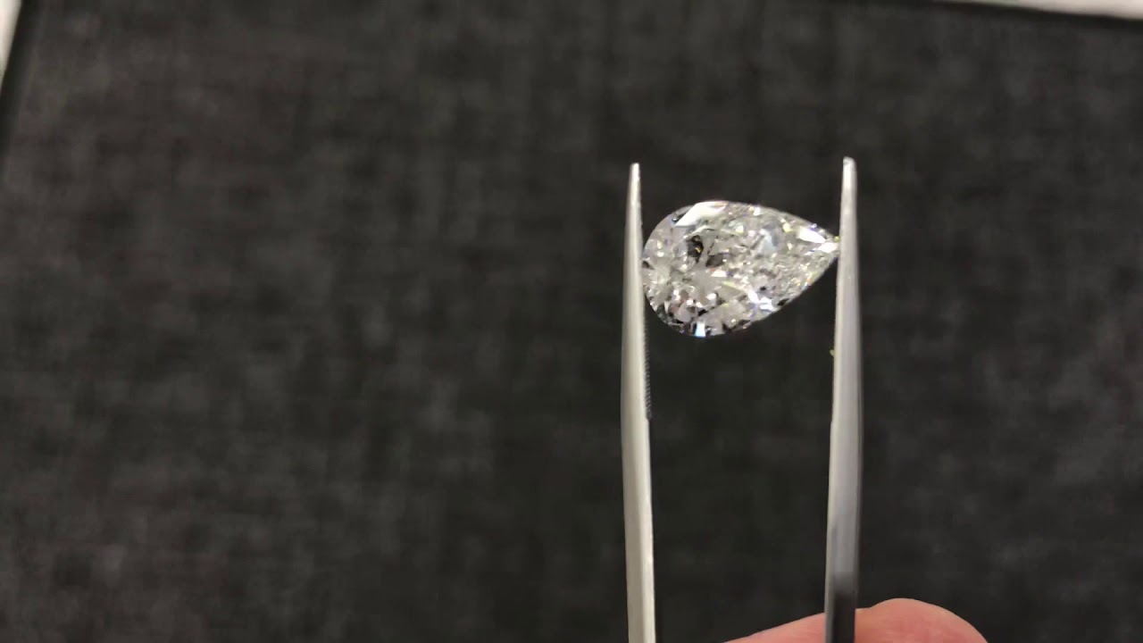 3 carat pear-shaped With the perfect length with ratio and a touch of blue florescence