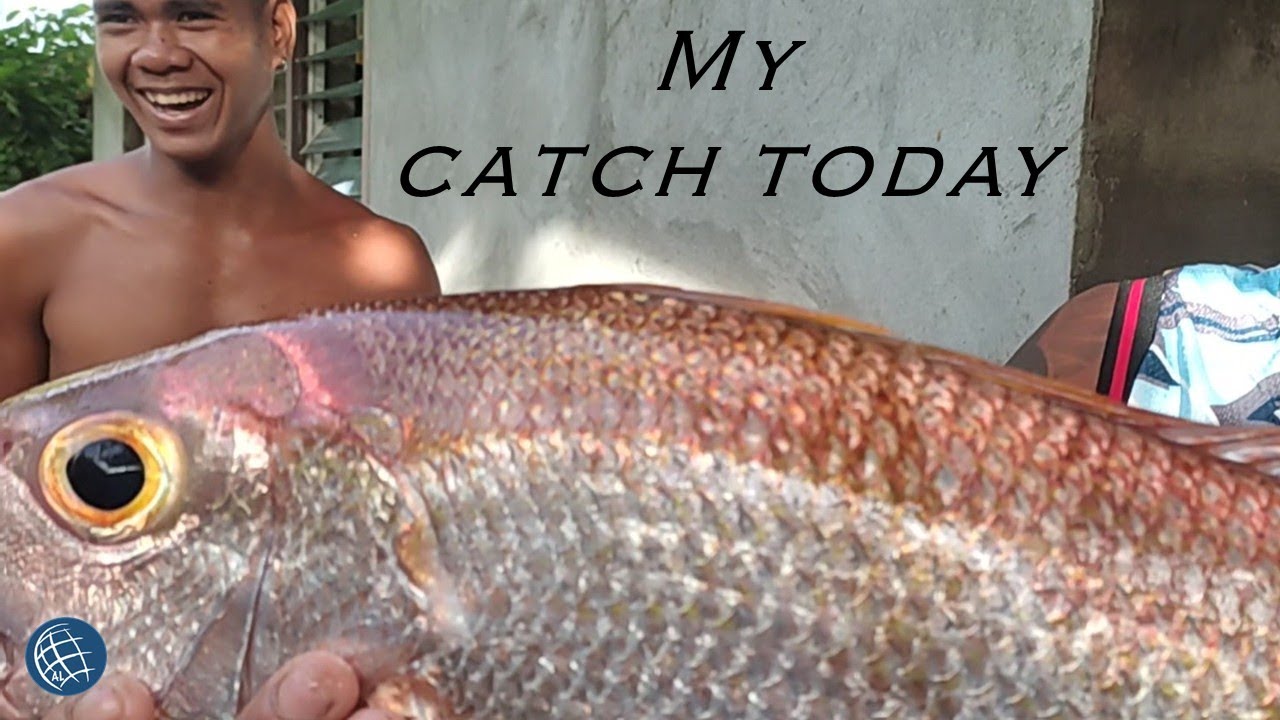 Philippine Fishermen present their catch