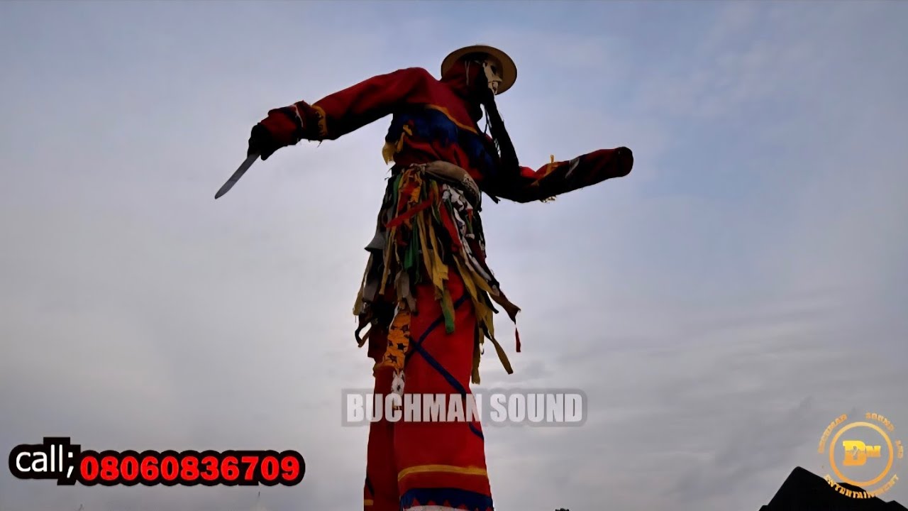 Masquerade danced with his colleagues. Voice by Morroco Junior. 