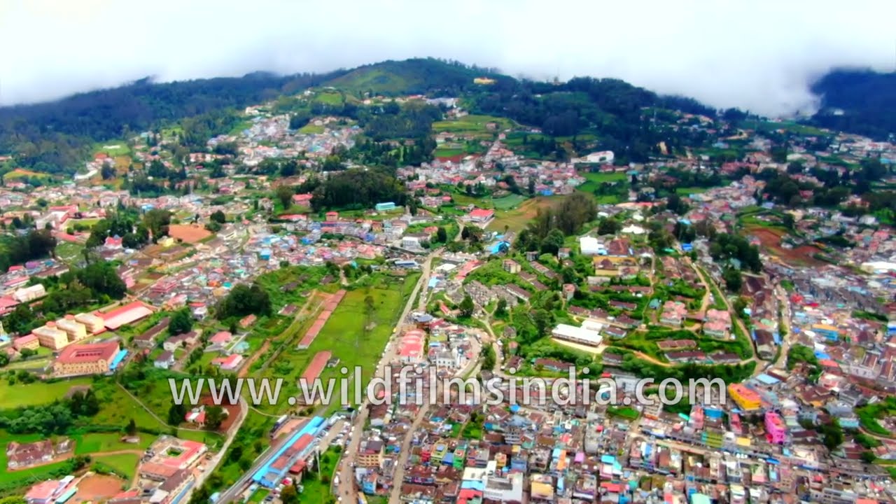 Terraced farms and homes spread across the hills of Ooty, in the Nilgiri Mountains of Tamil Nadu