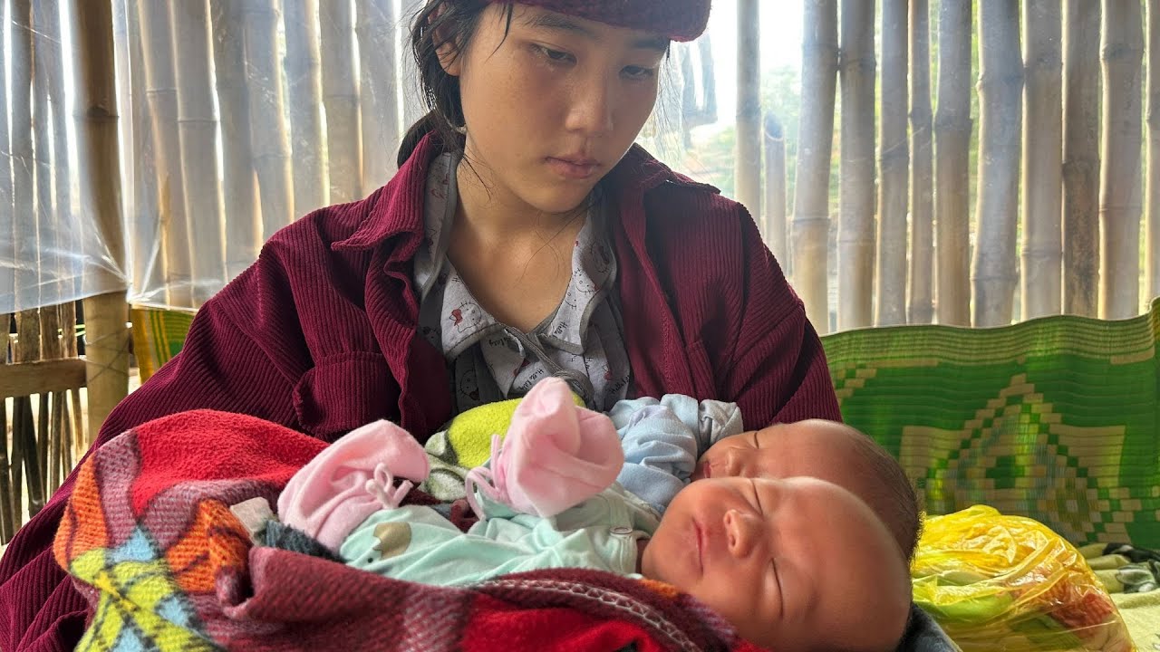 Single mom happily caring for her adorable twins with love