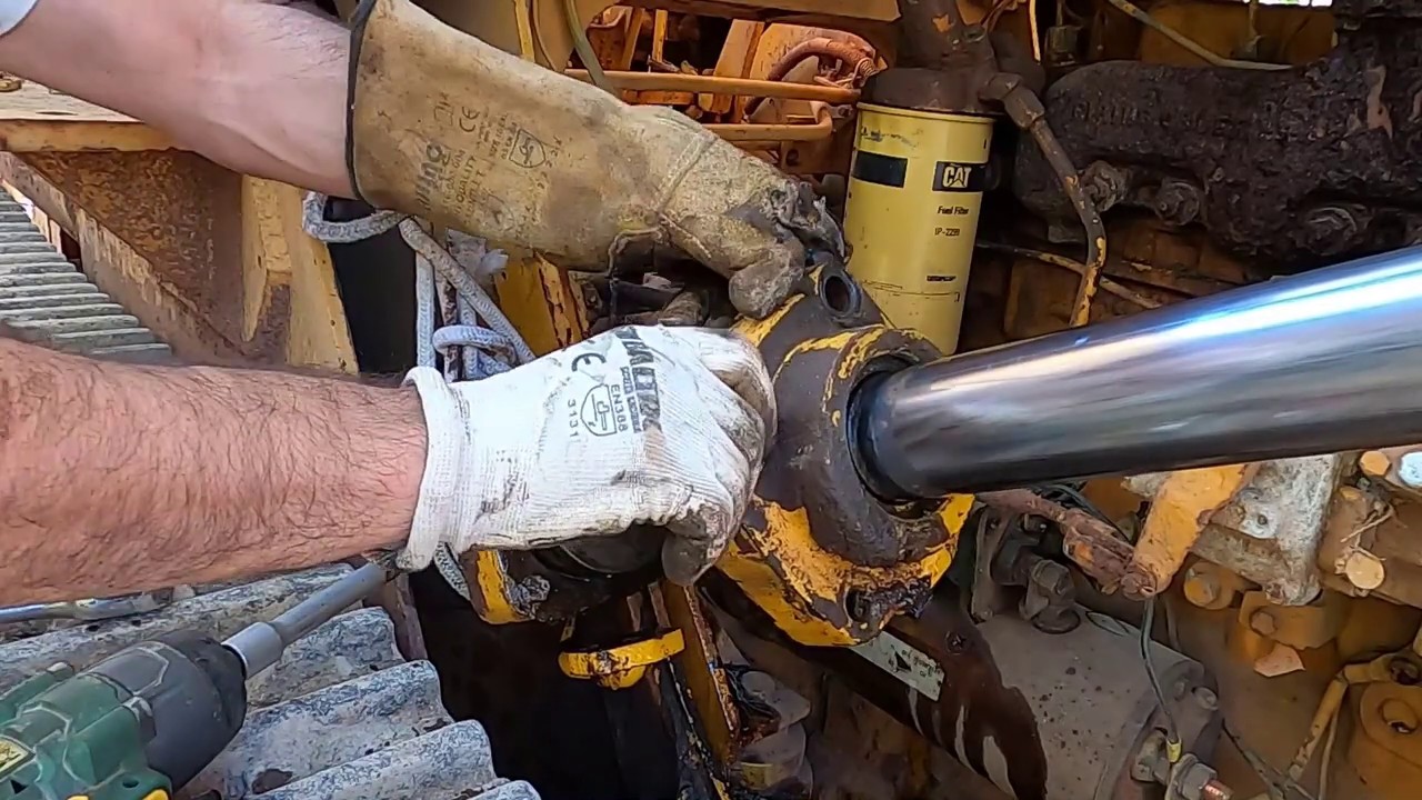 Disassembly of the piston rod, CATERPILLAR 931/941/951/955 . Sostituzione O-RING  Cat .