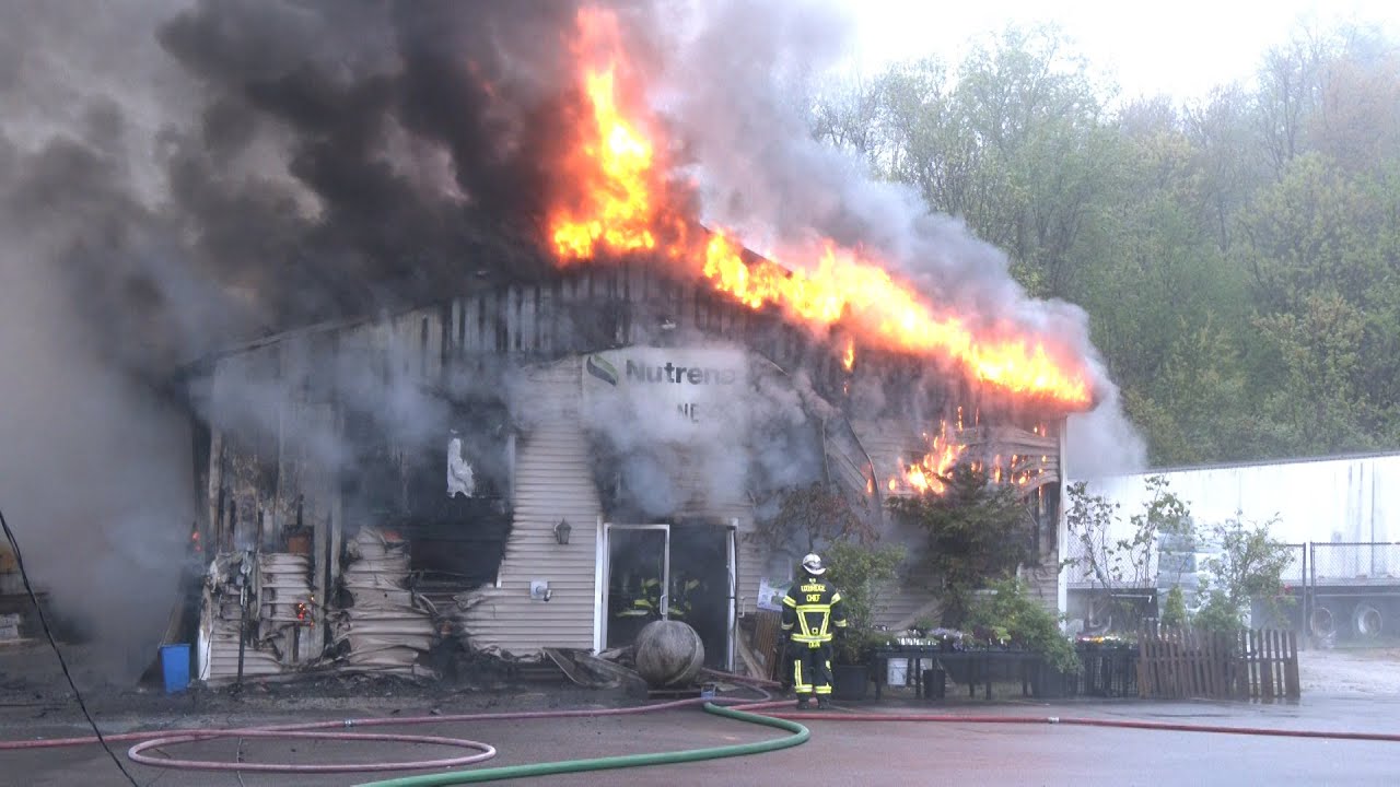 Fully involved Feeds & Needs commercial building fire in Mendon, Mass
