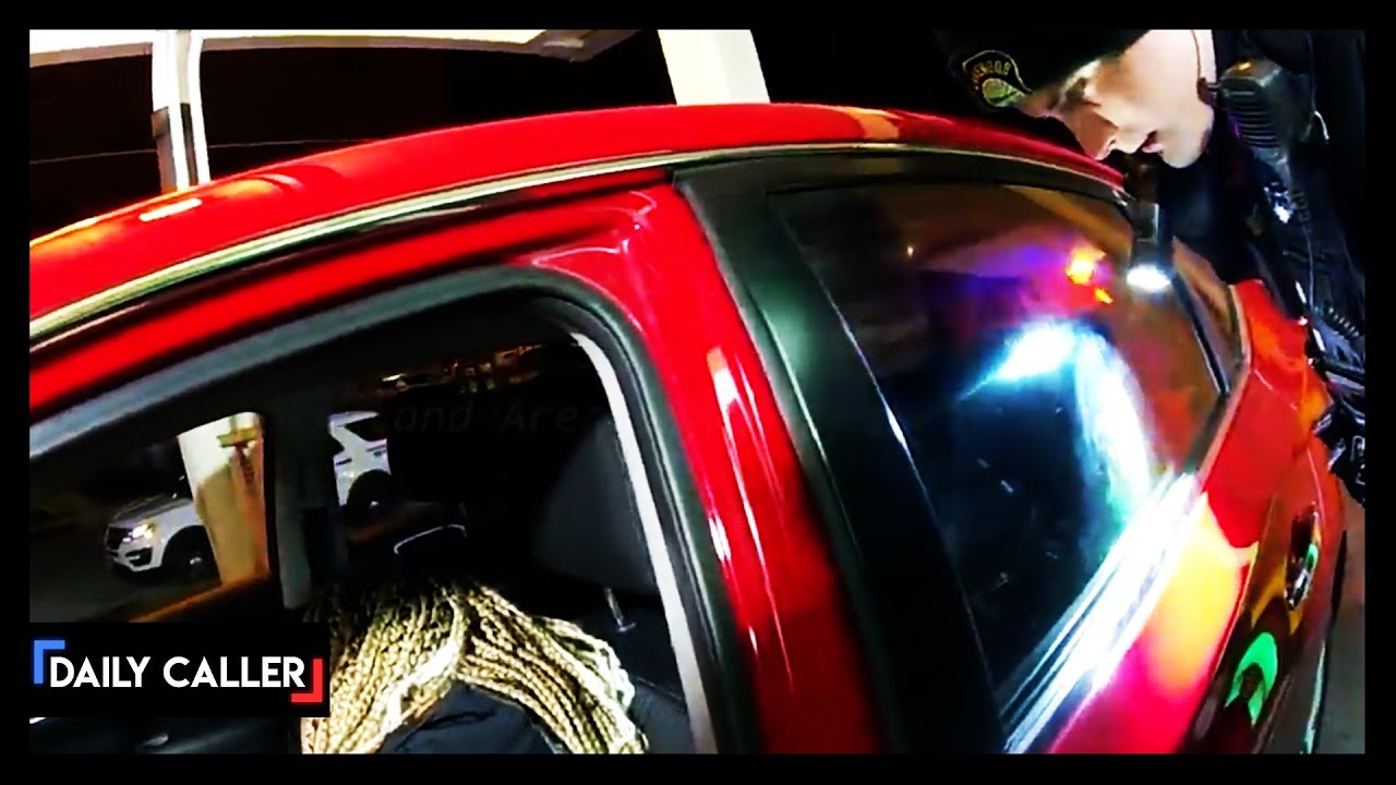 BODYCAM: Cops Rouse Sleeping Driver In Bank Drive-Thru