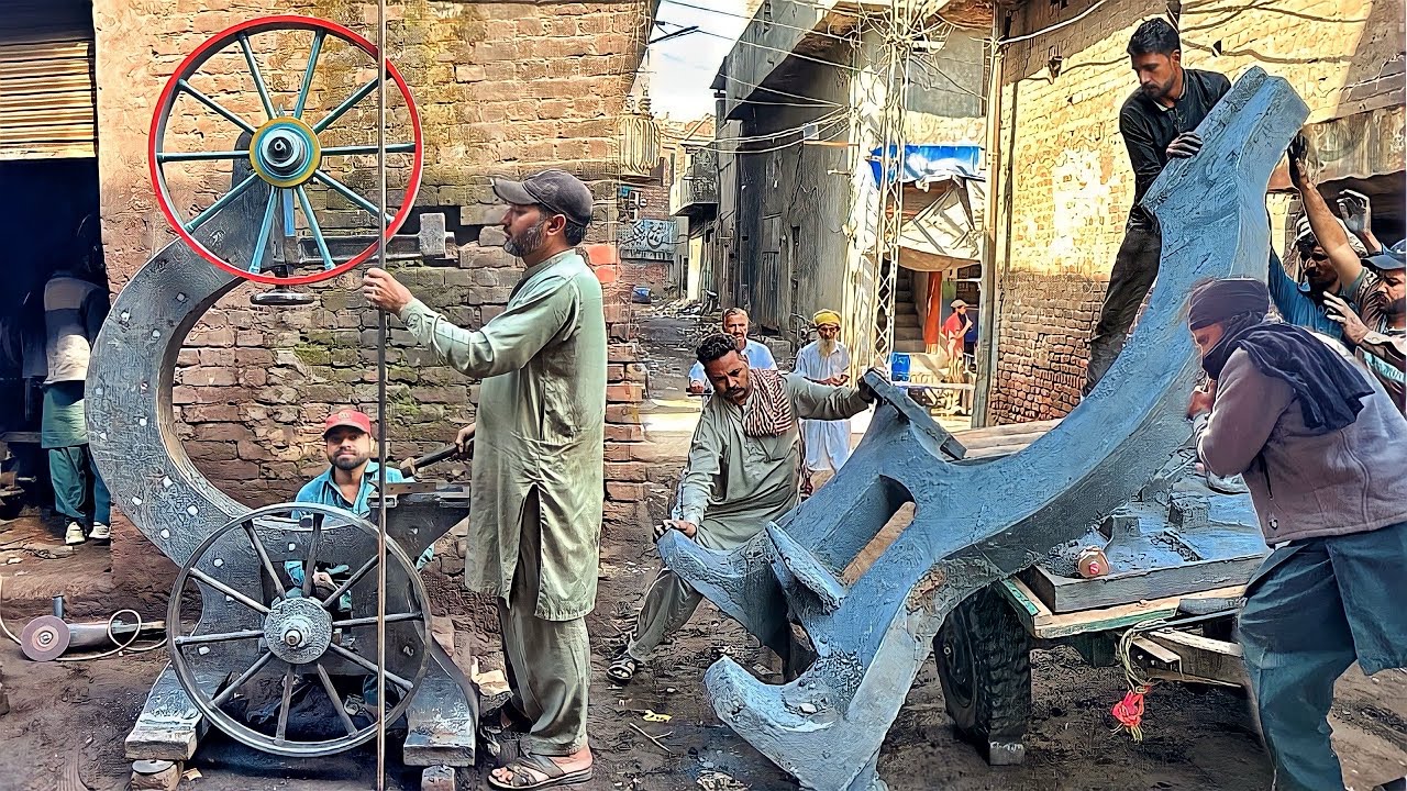 Hard Working Young Man Manufacturing Process of Giant BandSaw Machine in Factory|