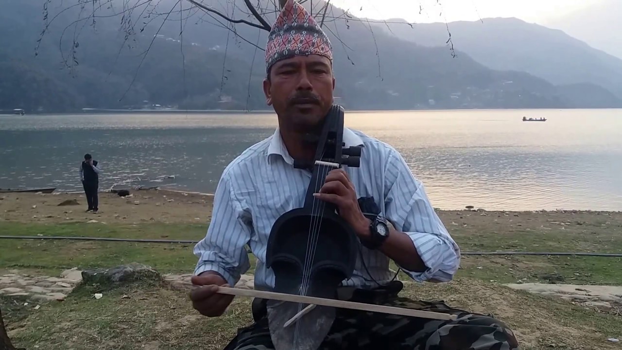 Resham firiri Nepali song by sarangi dai at fewa Lake Pokhara