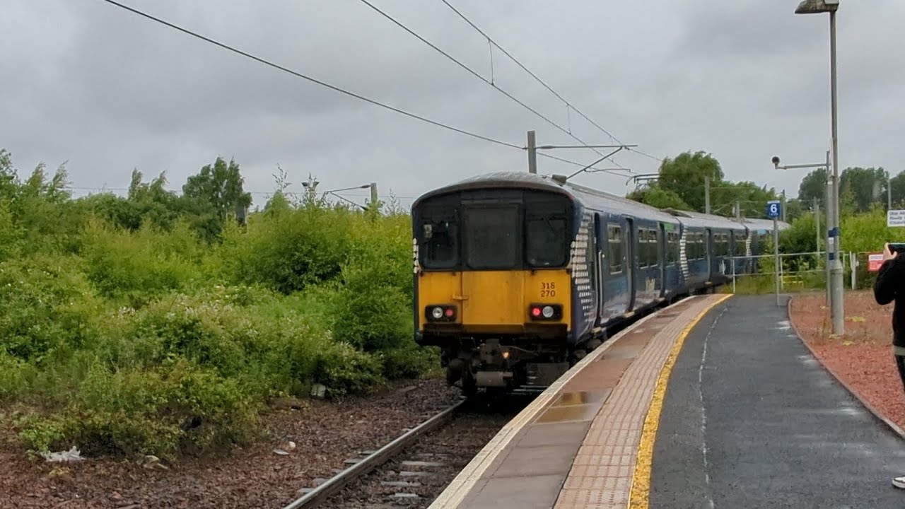 Class 318 Departing Rutherglen With A Very Loud Horn