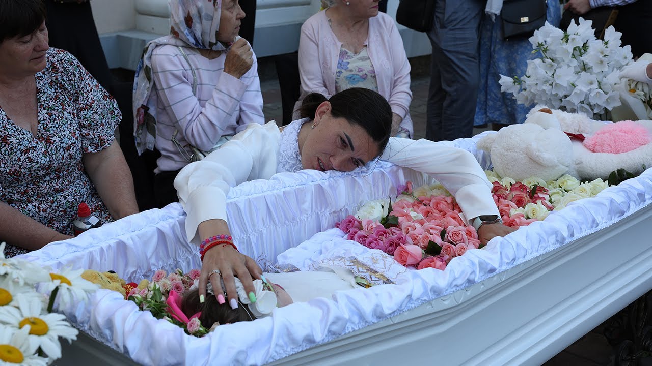 Ukraine mourns 4-year-old girl killed in missile strike. Victor Sajenko for AP