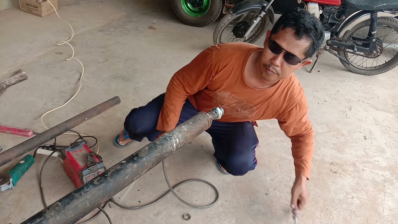 merakit drum /tong penghasil uap.