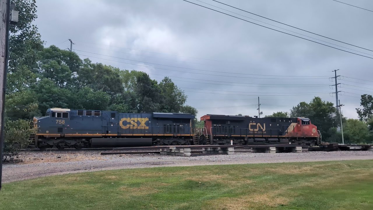 CN3818 and CSX758 speeding through Cassopolis, MI on the South Bend Subdivision 8/19/25