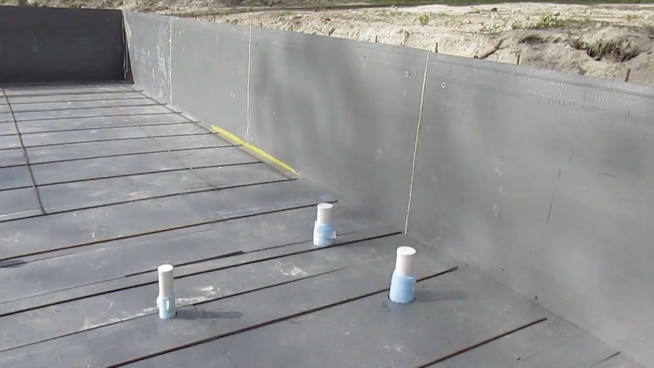 Under slab plastic below foam insulation.
