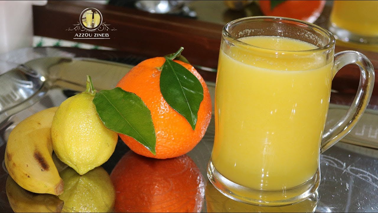 عصير ببرتقالة🍊 و ليمونة حامضة 🍋 و موزة  واحدة 🍌🍹 أكثر من لترين من العصير منعش و بدون ياغورت  رائع