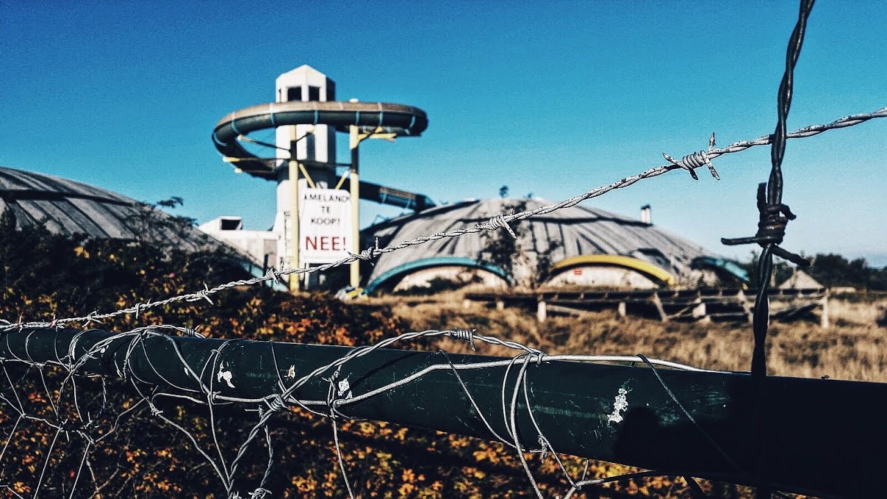 Exploring abandoned swimming pool Tropica Ambla Ameland