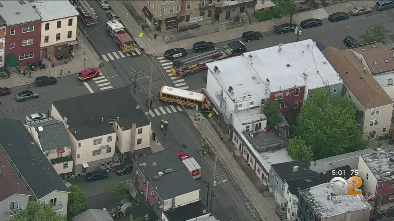 School Bus Crashes Into Salon