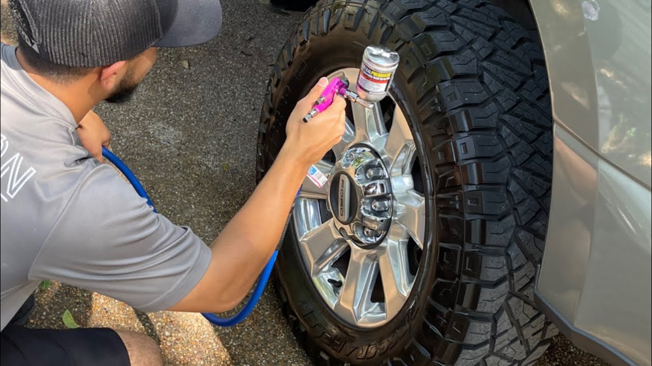 Applying tire shine through a aerosol spray gun