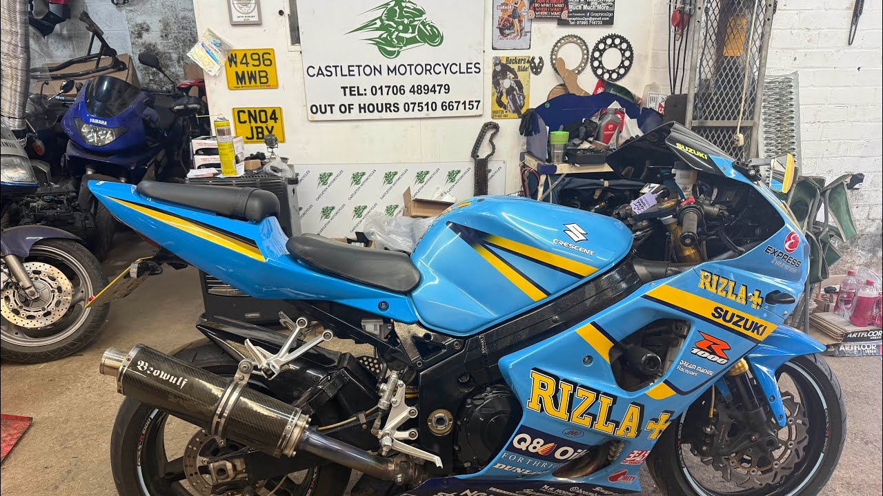 Suzuki GSXR 1000 2004 in for an Oil cooler replacement, a full service and horn repair.