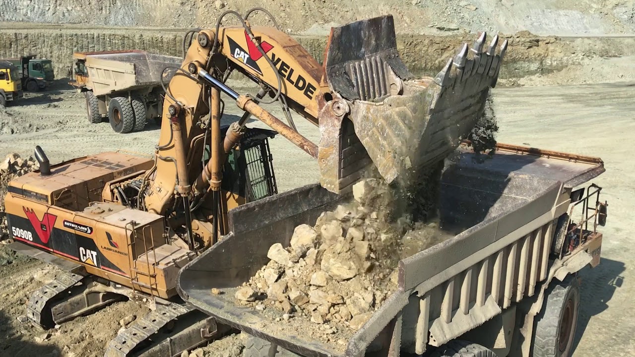Caterpillar 5090B Shovel Excavator Loading Caterpillar Dumpers - Kyvos Ate