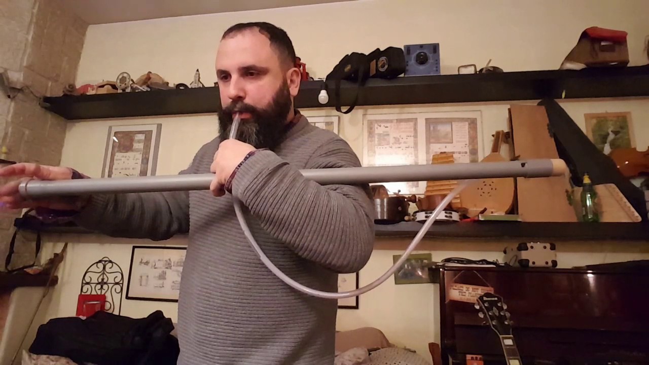 Flauto baritono, tubo pvc braga del cesso, tubo benzina fiat anni 90, stocco di legno.