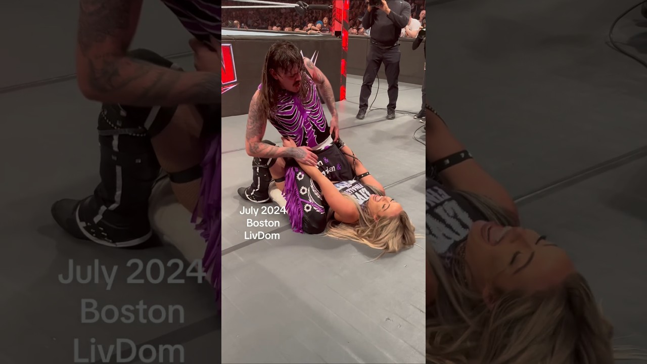 Liv Morgan is having a little too much fun with Dominik Mysterio while lying down