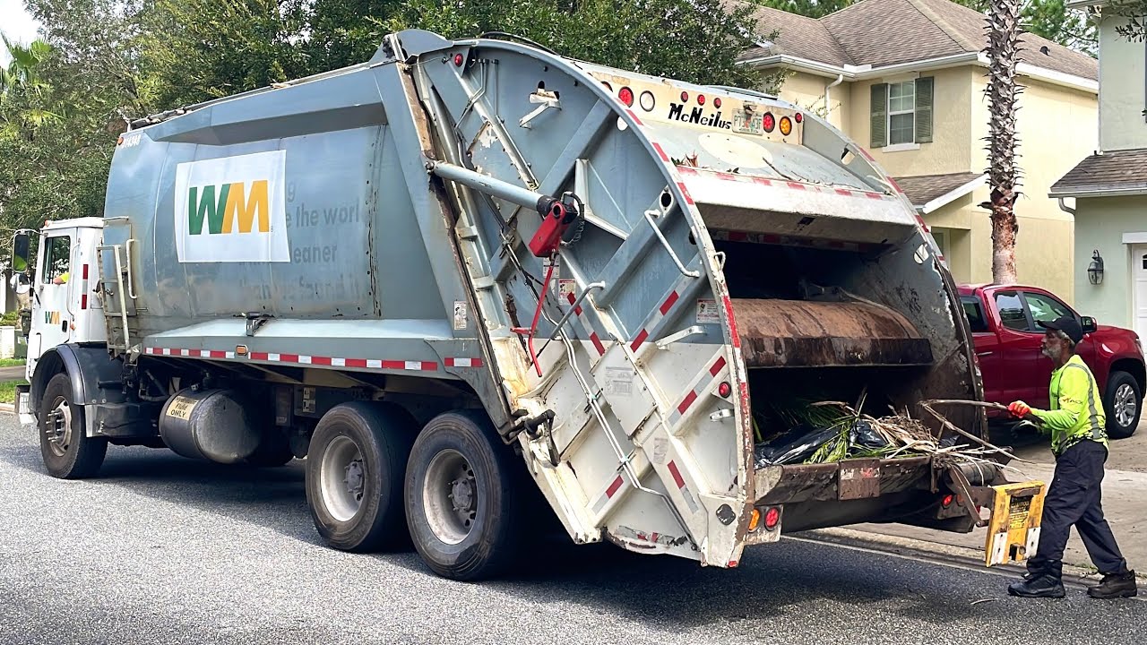 Ex-Advanced McNeilus Rear Loader Garbage Truck on Yard Waste