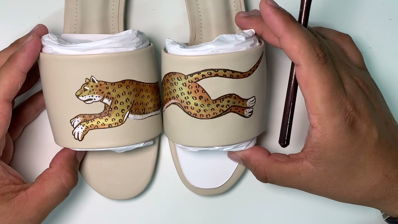 Hand-painting our Leopard Beige Slide
