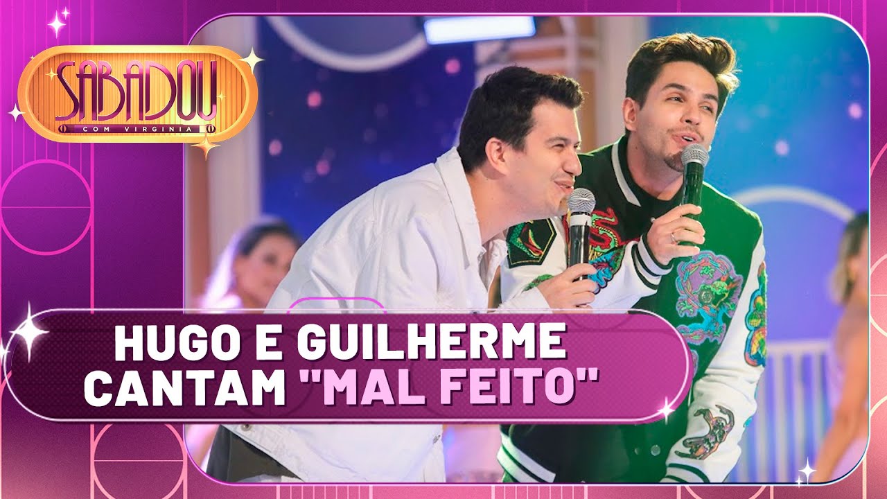 Hugo e Guilherme cantam 