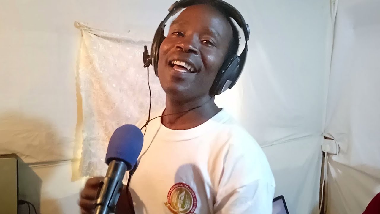 KEN MERCY AMEKUA MWIMBAJI NOW DAY A GOOD SONG (OCHOMIN WEE JEISO BY MERCY KEN)