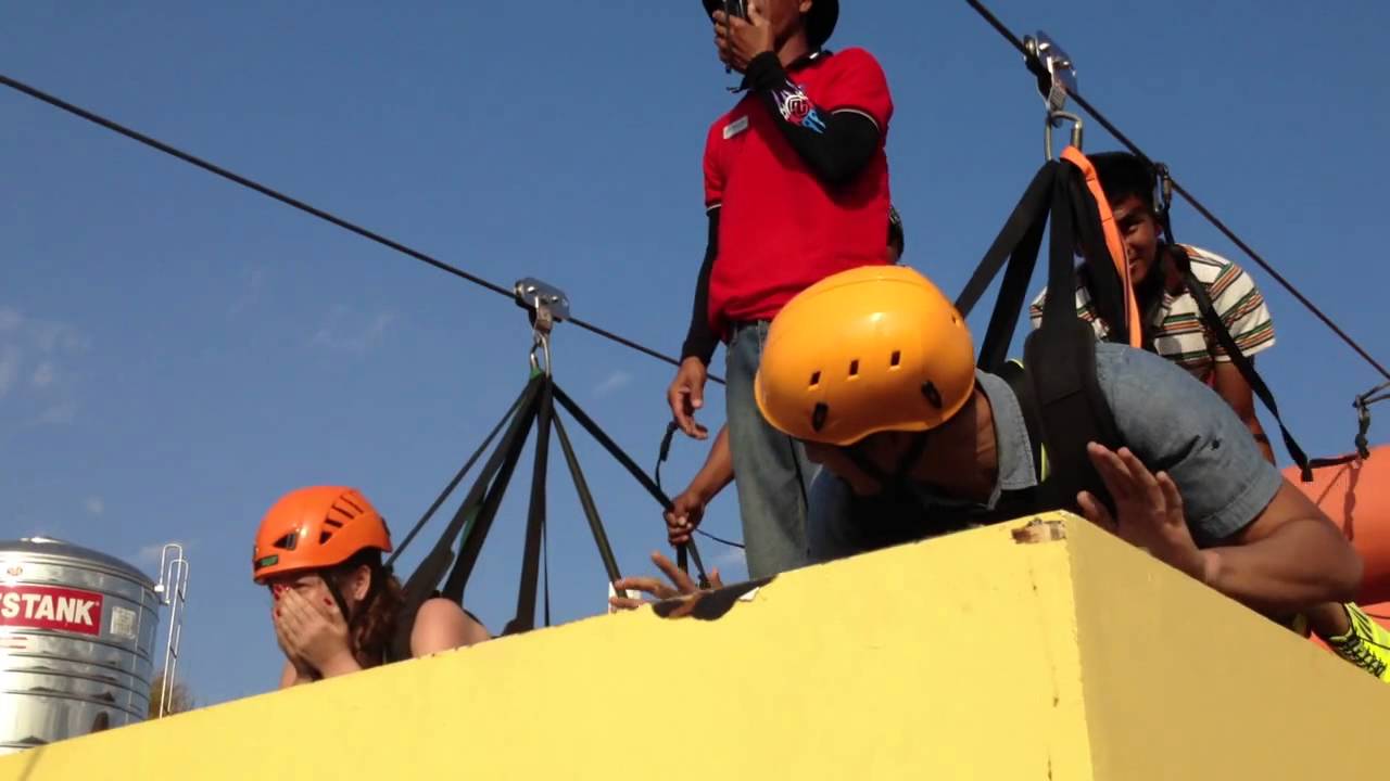 Georgina and Borgy zipline at Hannah's Beach Resort & Convention Center